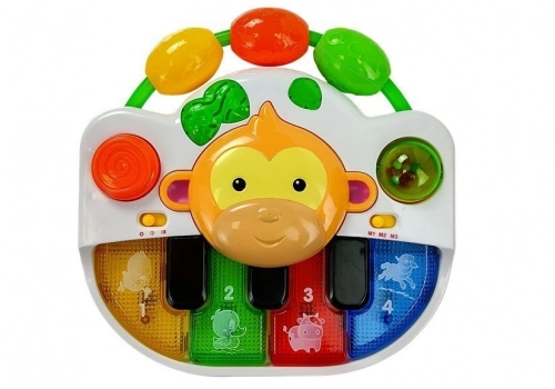 A piano with a monkey for a baby. Sound and light
