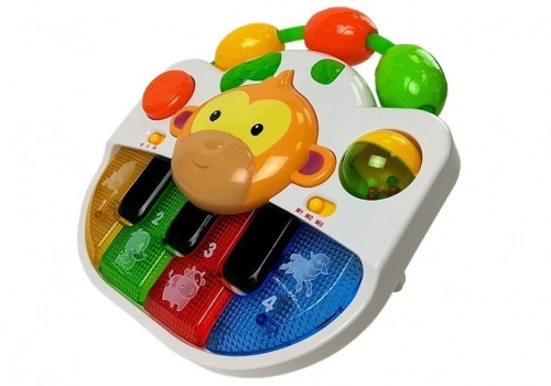 A piano with a monkey for a baby. Sound and light