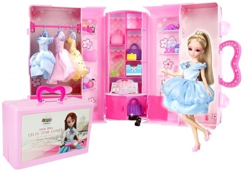 Doll, Model. Set of Clothes. Dressing. Jewelry in a Suitcase